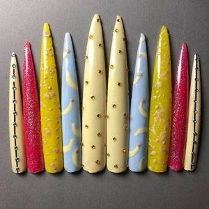 Custom nails inspired by jeffree stars new banana fetish palette.